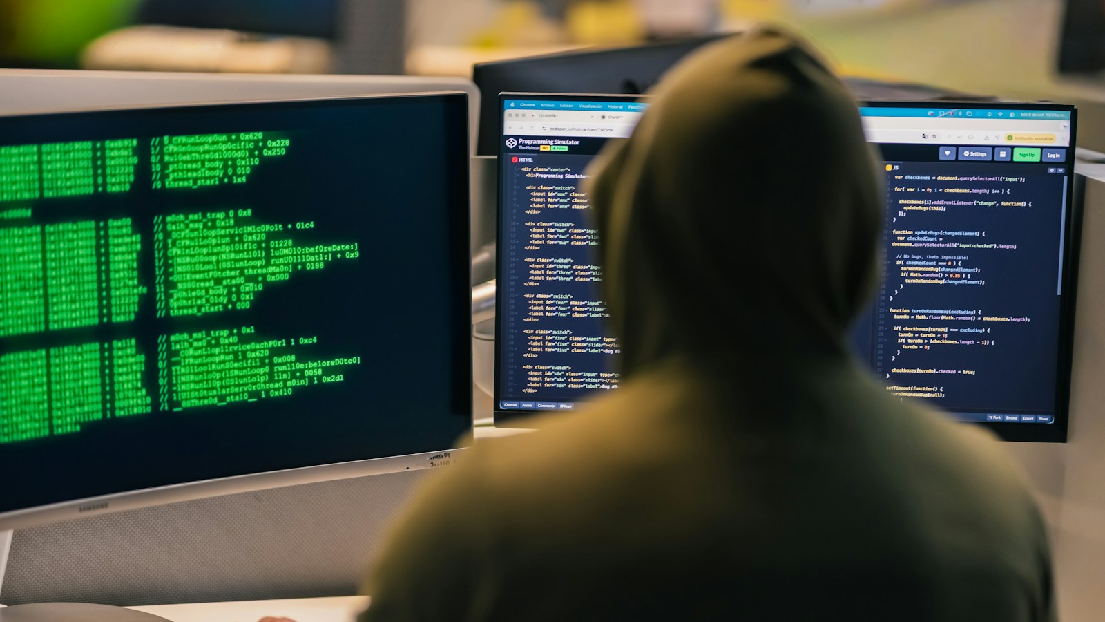 Attacker working across multiple screens, illustrating the PHP2Shell and Fragnesia exploit chain used to root 25 servers